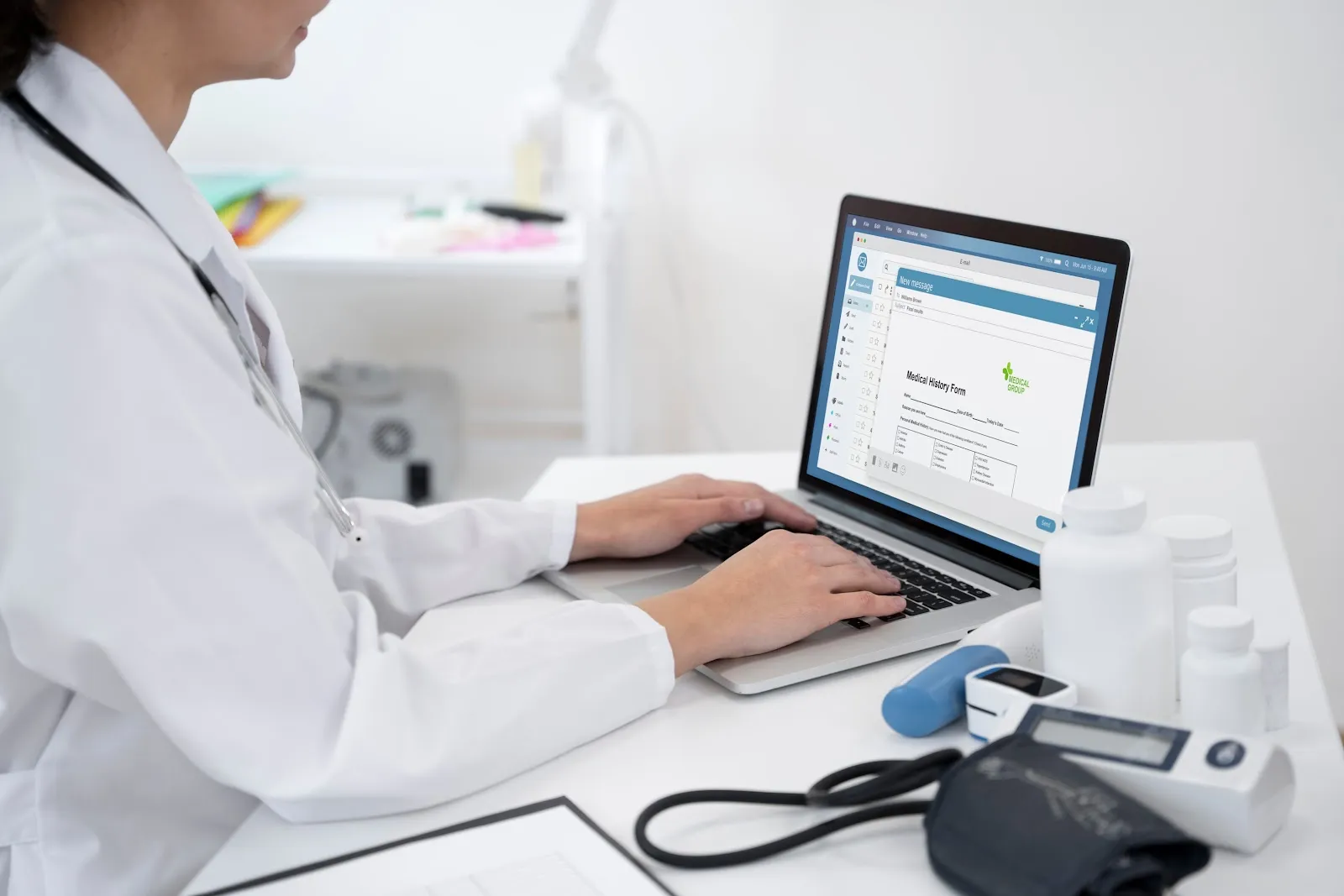 Dentist using a laptop